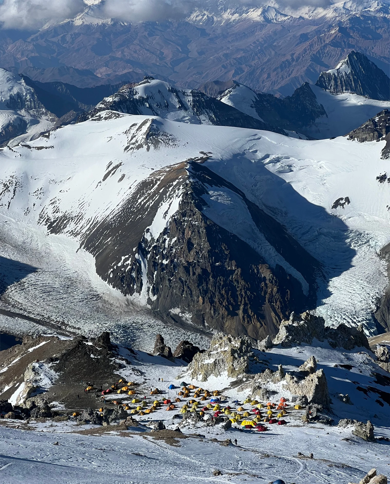 Aerial view looking down at the colorful high camp tents on Aconcagua