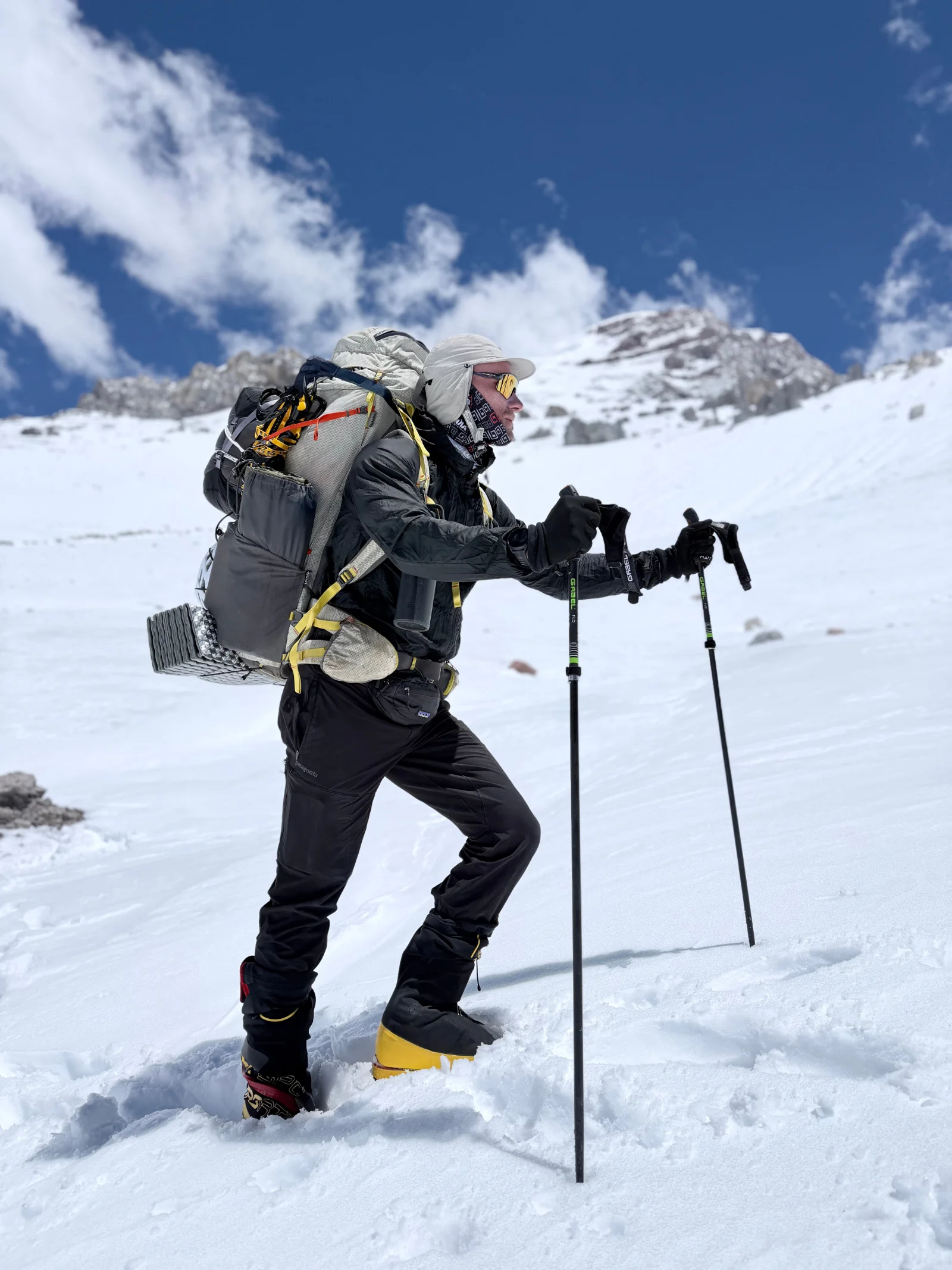 Mountaineer in full high-altitude expedition gear on Aconcagua