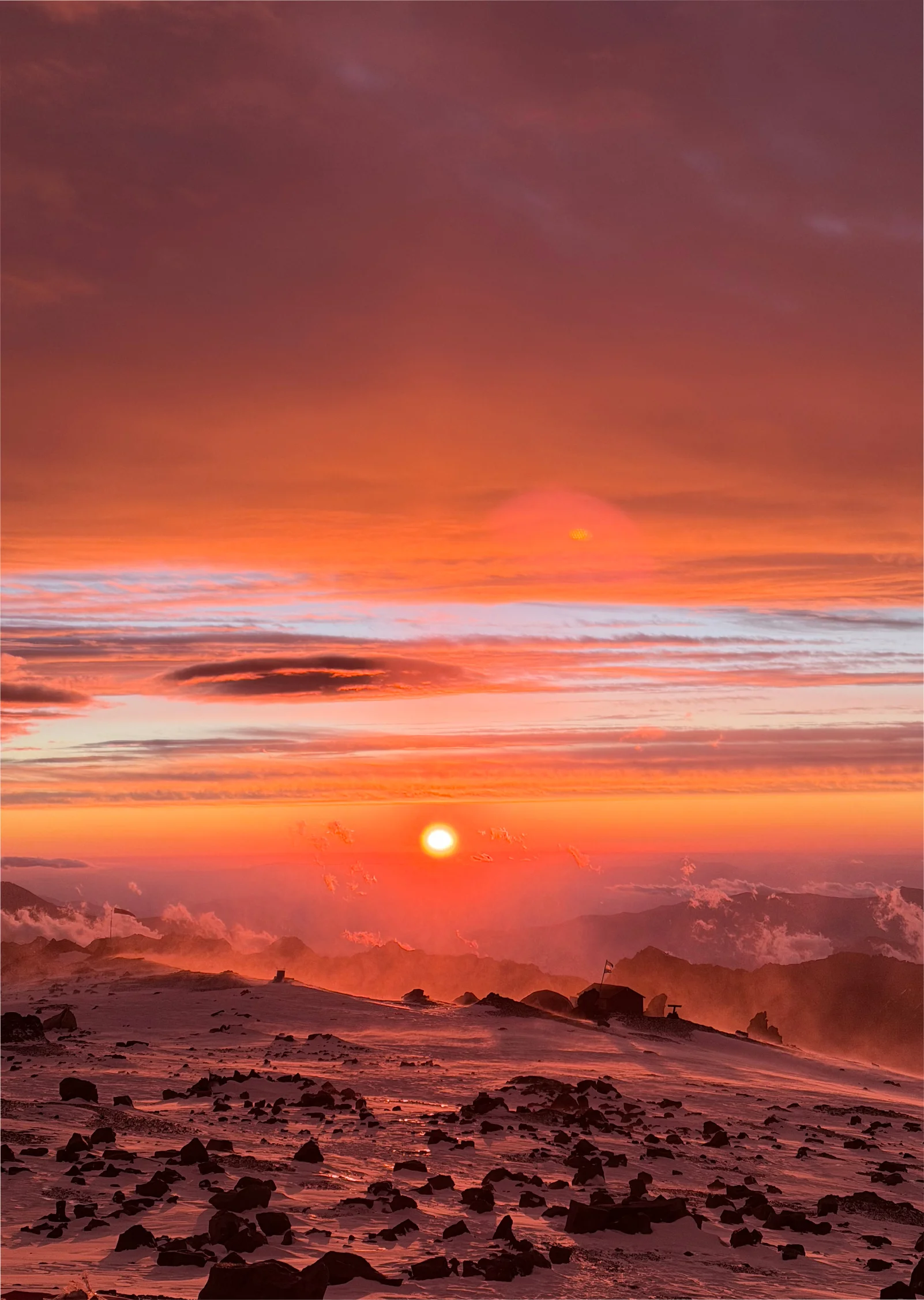 Dramatic fiery red sunrise over the Andes from high altitude